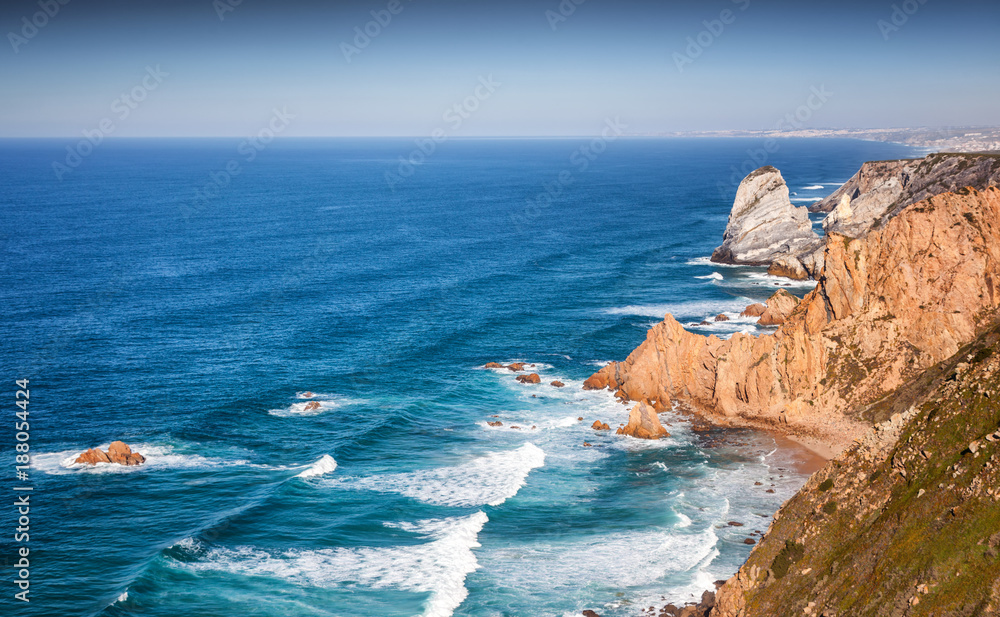 Beautiful ocean landscape, rocks and waves. Cape Roca, Portugal, The westernmost point of Europe and a popular destination for travel
