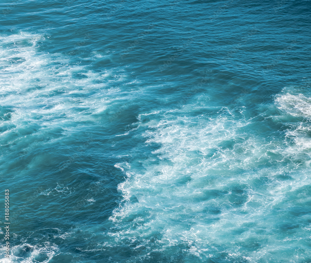 Abstract natural background, ocean waves and foam from a height