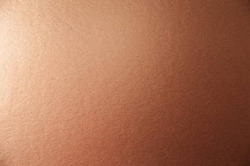 Texture of brown metallic paper background for design Christmas or New Year's party cards