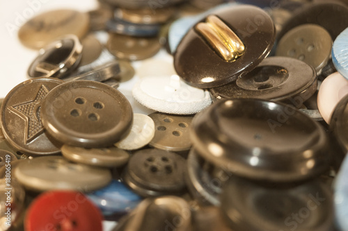  buttons, plastic buttons for clothing. colorful, colored buttons. Close-up buttons. fungus. mixed colors