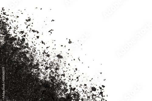 Pile of Carbon charcoal  splash isolated on white background top view photo