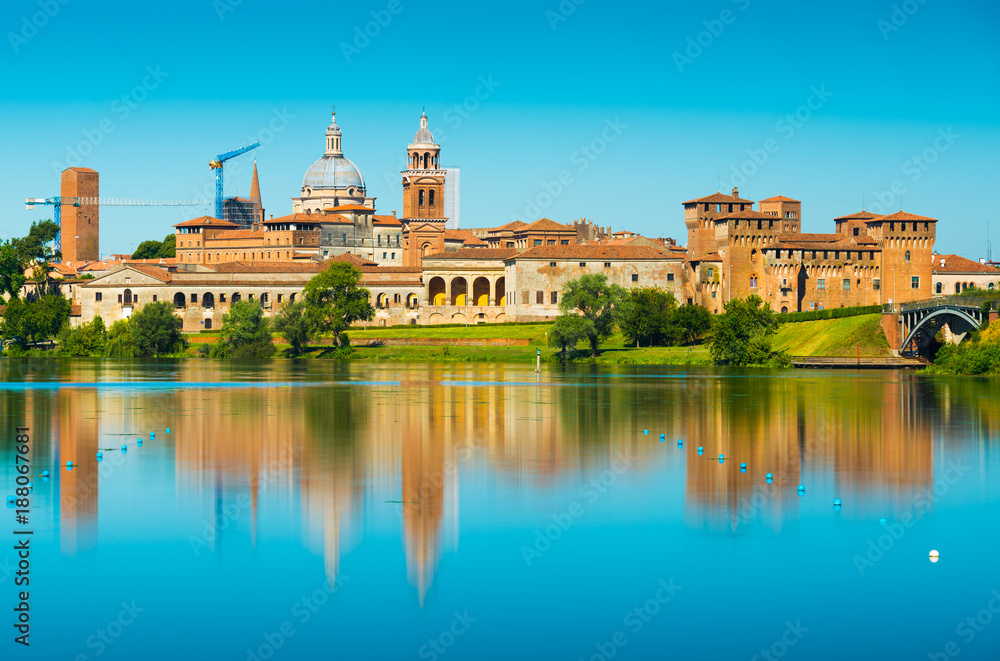 Cityscape reflected in water. Mantova, Lombardy, Italy