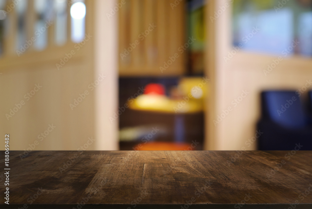 Empty wooden table in front of abstract blurred background of coffee shop . can be used for display or montage your products.Mock up for display of product.