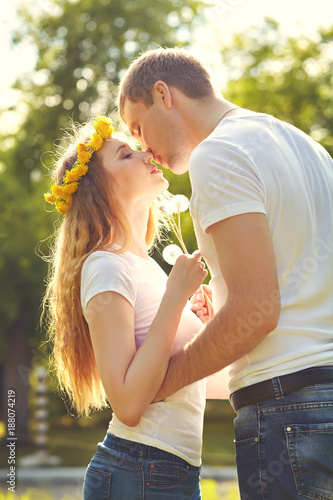 Young happy couple in love outdoors