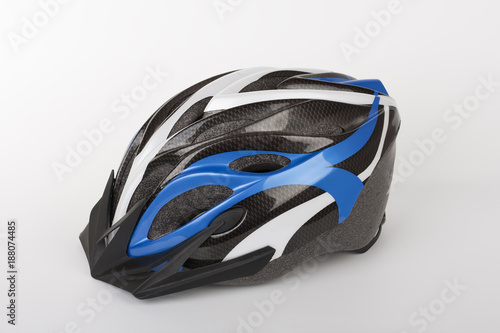 Blue bicycle helmet, protection of head injury on cycling, studio photo, isolated on background