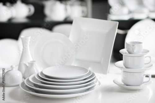 Hotel restaurant white dishes assortment. Stylish crockery set. Luxury and sophistication concept photo