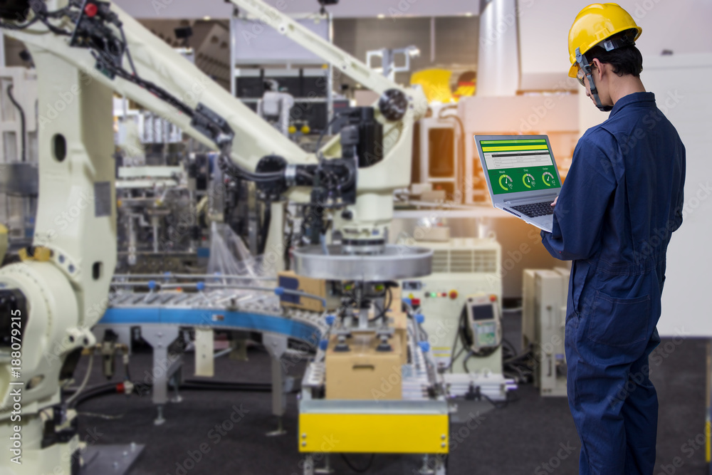 Industry 4.0 Robot concept .Engineers are using virtual AR to maintain and check the work of human robot in the 4.0 Smart Factory. Industry 4.0 Robot concept .Engineers are using virtual AR to maintain and check the work of human robot in the 4.0 Smart Factory.