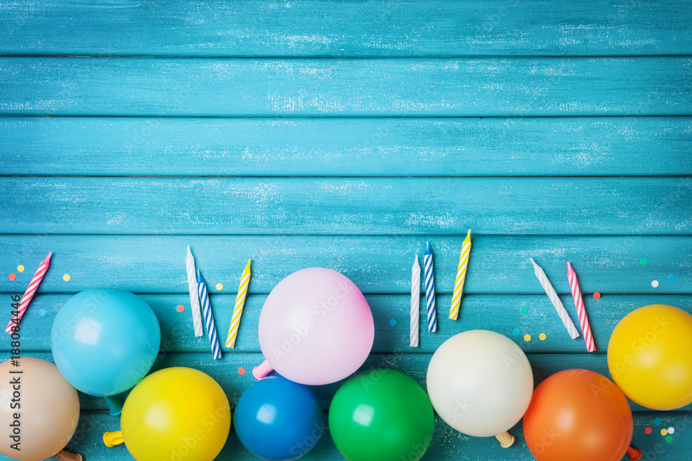 Birthday table with colorful balloons, confetti and candles top view. Party  background. Festive greeting card. Stock Photo | Adobe Stock