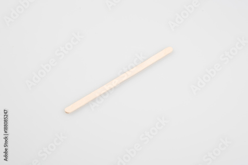 wooden stirrer for coffee in white background