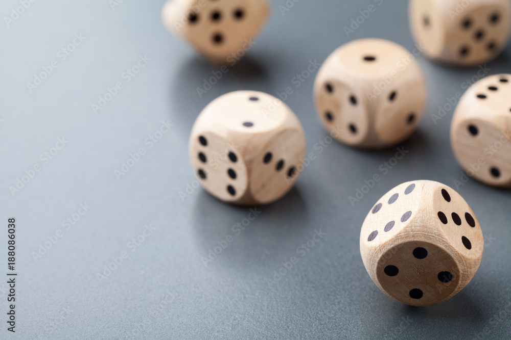 Dice on gray table. Board game. Gambling devices. Dice on gray table. Board game. Gambling devices.