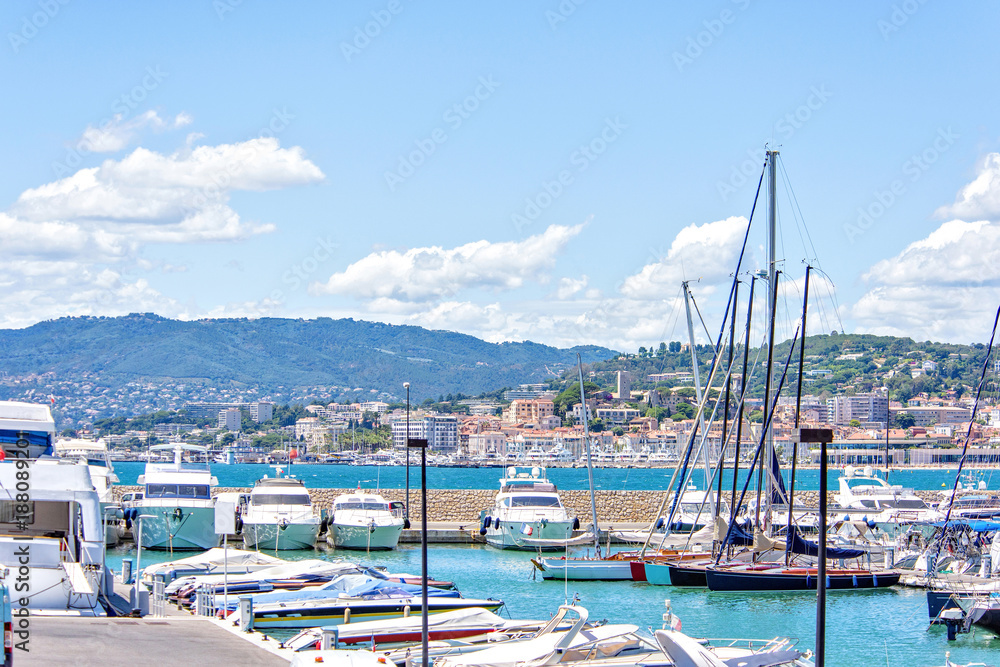 Daylight view to parked yachts and sail boats in port