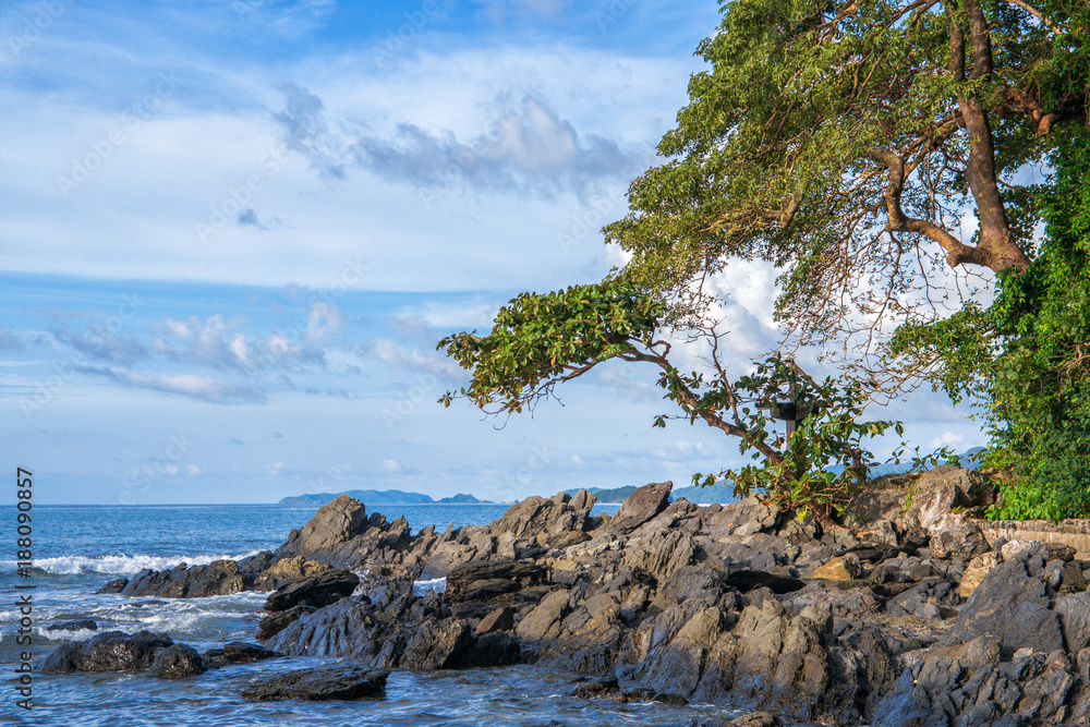 Beautiful sunset view on the rocky beach in El Nido, Palawan island, Philippines Beautiful sunset view on the rocky beach in El Nido, Palawan island, Philippines