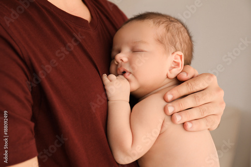 Father with cute little bab...