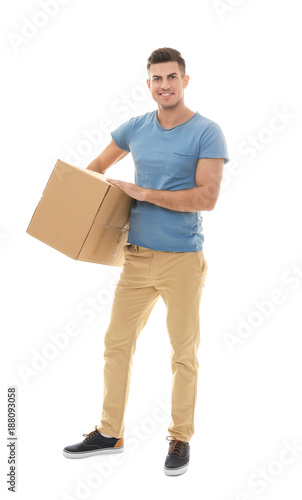 Man with moving box on white background © Africa Studio
