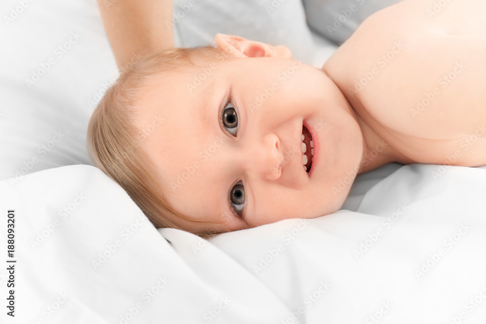Cute little baby lying on bed Cute little baby lying on bed