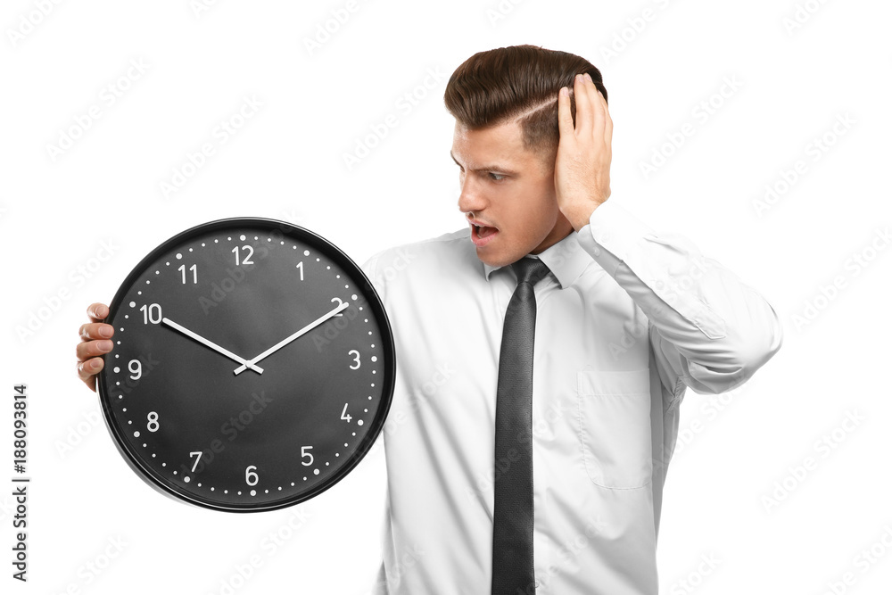 Shocked manager with clock on white background Shocked manager with clock on white background