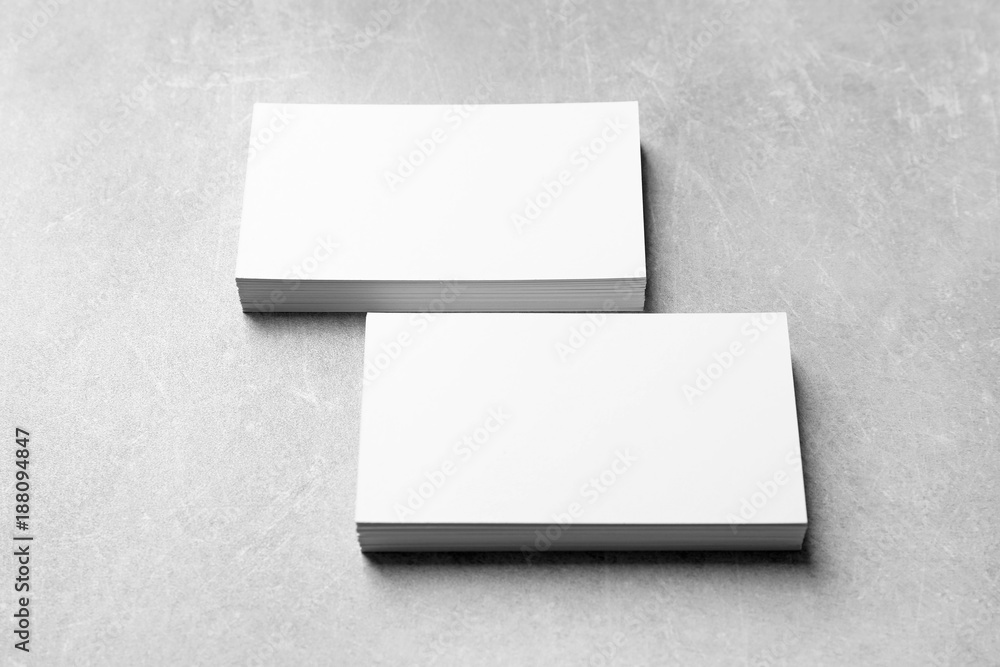 Mock up of business cards on grey background Mock up of business cards on grey background
