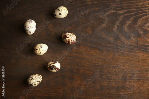 Quail eggs on wooden table