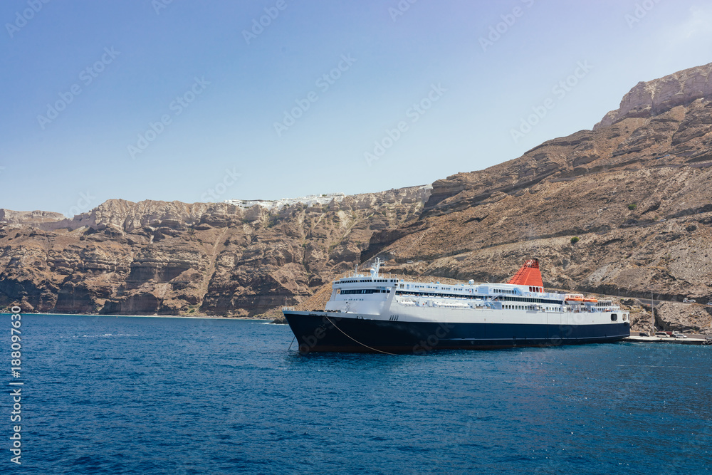 Cruise ship at Santorini port. Greece in summer.
