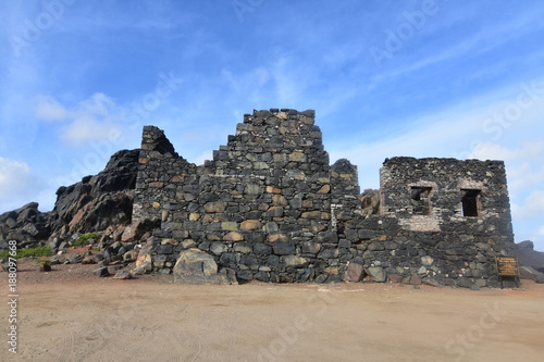 Front view of an ancient gold mill ruin in Aruba photo