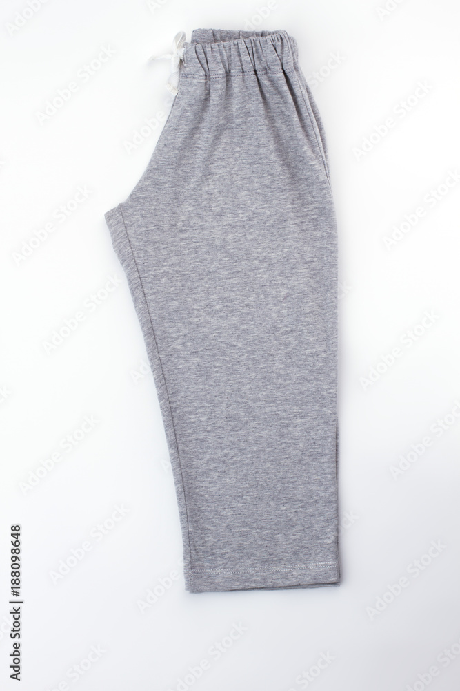 Pants folded in half on white. Simple gray melange sleepwear bottom. Quality pajama for little boys. Pants folded in half on white. Simple gray melange sleepwear bottom. Quality pajama for little boys.