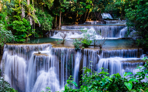 Waterfall in tropical forest at Huay Mae Khamin National Park, Thailand photo