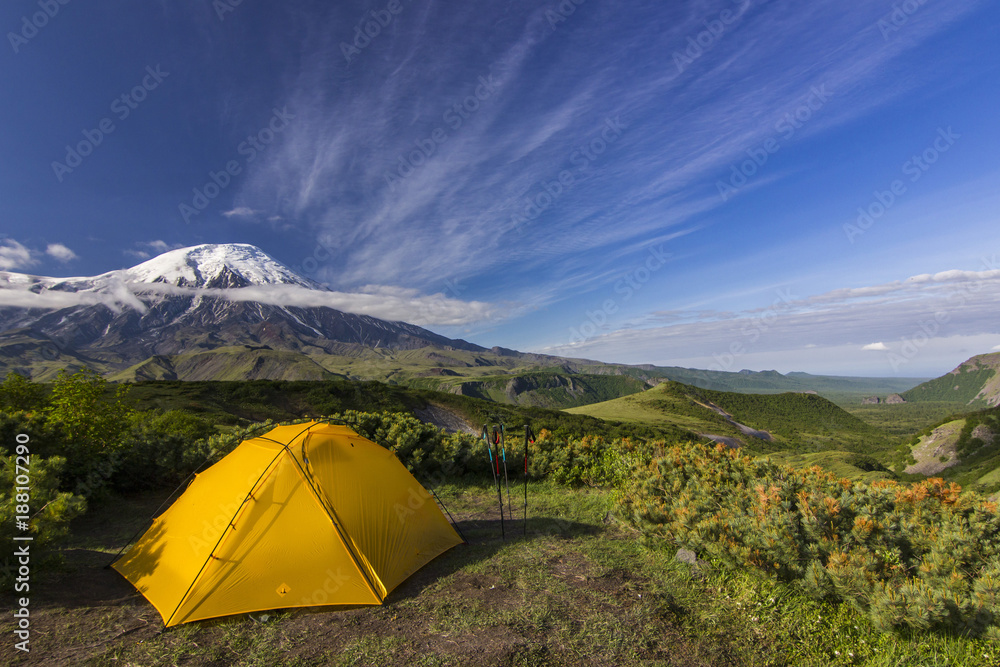 yellow tent near volcanoes of Kamchatka