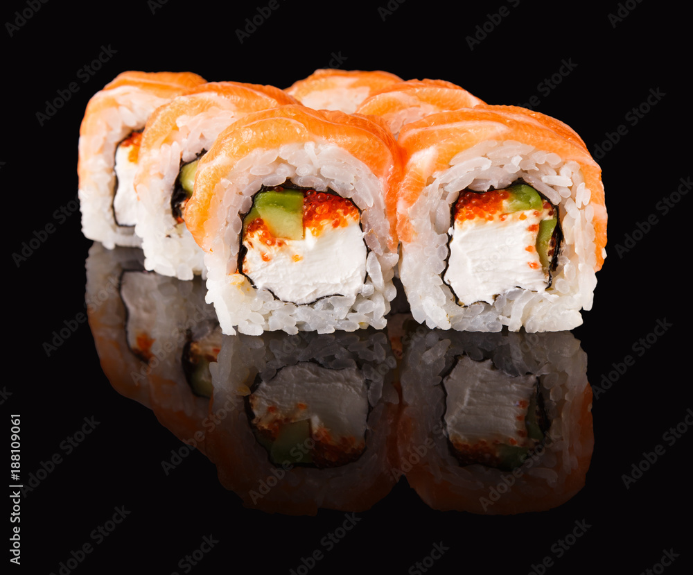 Japanese rolls on black mirroring background Japanese rolls on black mirroring background