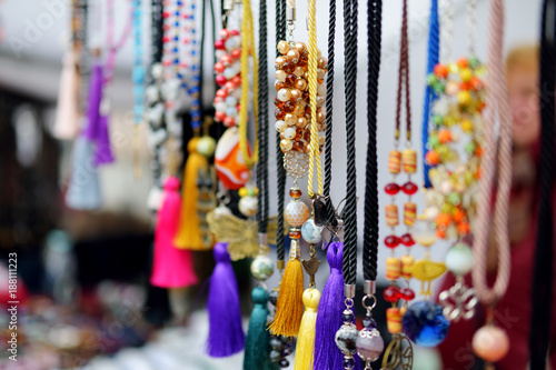 Colorful handmade necklaces decorated with beads sold on Easter market in Vilnius