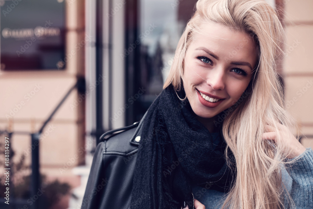 Beautiful blond woman portrait.Close-up Fashion woman portrait of young pretty trendy girl posing at the city, autumn street fashion. laughing and smiling portrait.trendy.Spring urban outfit. Beautiful blond woman portrait.Close-up Fashion woman portrait of young pretty trendy girl posing at the city, autumn street fashion. laughing and smiling portrait.trendy.Spring urban outfit.