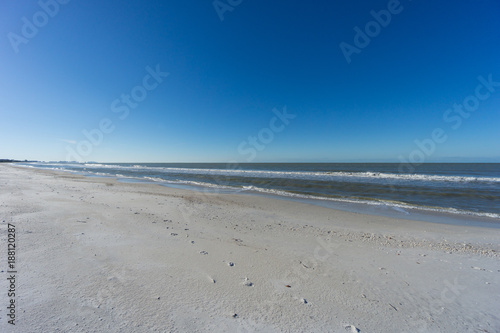 USA  Florida  Early morning at endless barefoot beach with some tracks in the sand