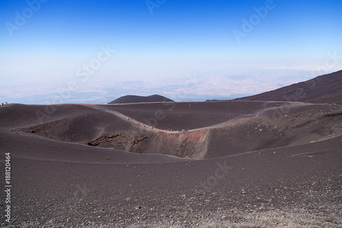 The volcano of Etna, Sicily, Italy. Large crater and hiking trail