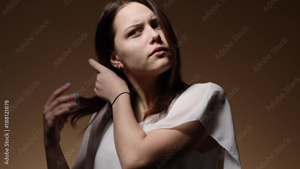 Portrait of a teen girl playing with her hairstyle Portrait of a teen girl playing with her hairstyle