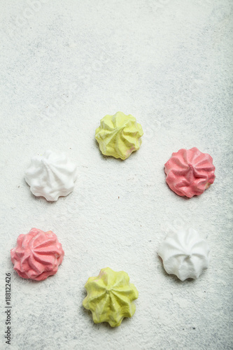 French kisses - meringue on a vintage white background.