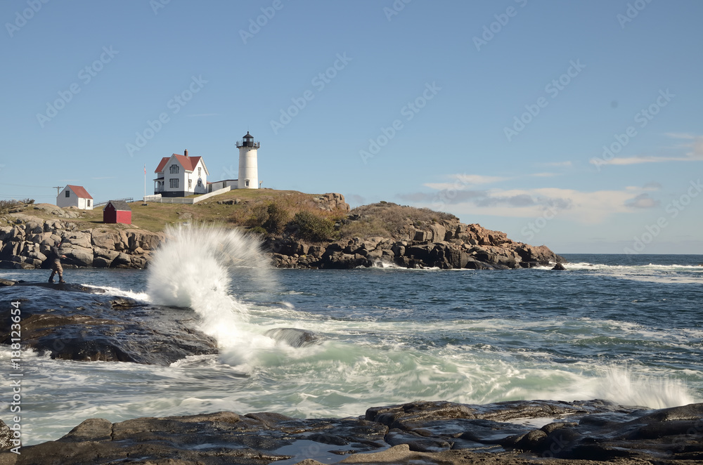 Waves crashing in front of Nubble lighthouse, Cape Neddick Maine 
