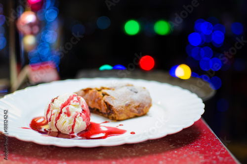 dessert on a plate on a background of colored bokeh