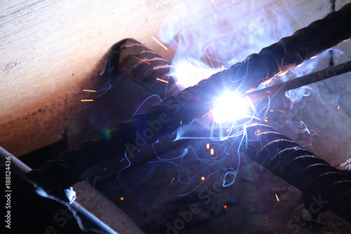 Welding of the reinforcing steel rods for reinforced concrete photo