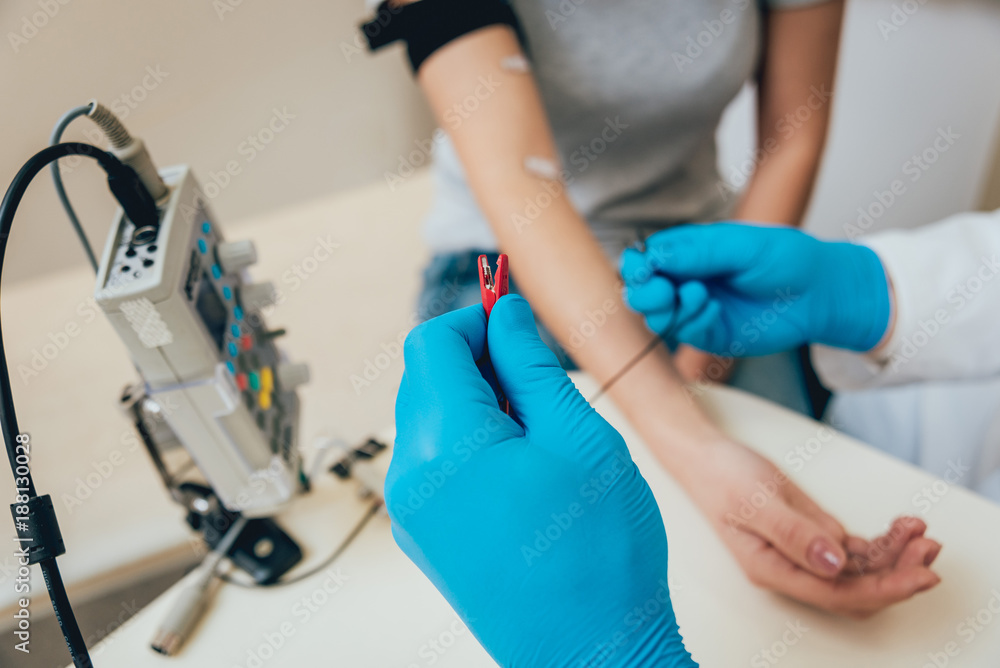 Patient nerves testing using electromyography. EMG Patient nerves testing using electromyography. EMG