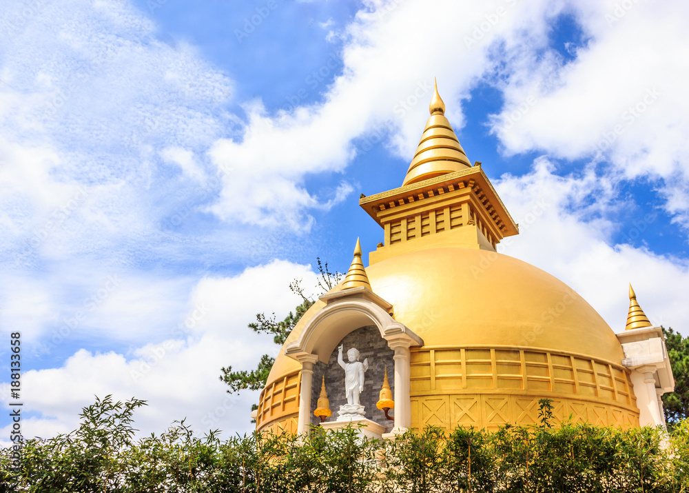 Beautiful view of Sino-Vietnamese Zen Buddhist temple Chua Truc Lam in a sunny summer day with blue sky and smooth cloud, outside the resort town of Dalat, Vietnam