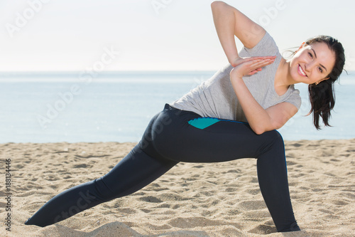 Fit young girl training yoga poses