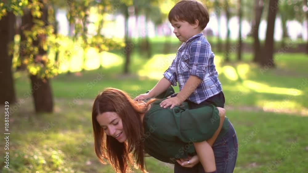 baby riding on my mother's back Stock Video | Adobe Stock
