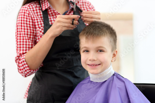 Female hairdresser working ...