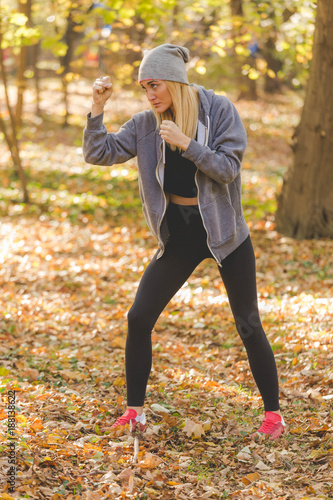 Photos Girl in boxing guard exercise in the forest