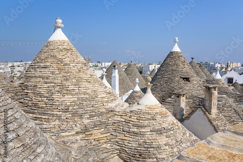 Conical rooftop sof the trullis in Alberobello photo