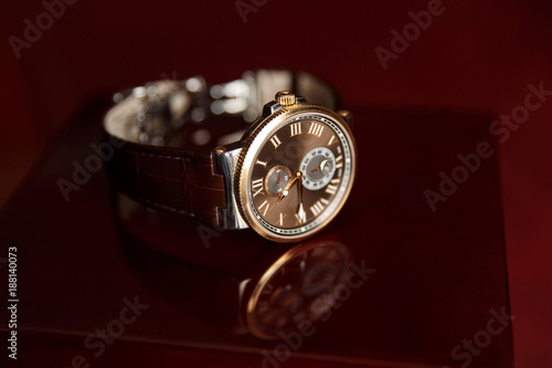 Men's watch, close-up golden hand watch. Best accessories for man
