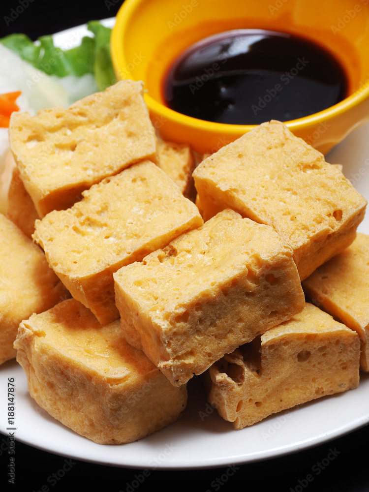 Deep fried tofu with sweet and soy sauce