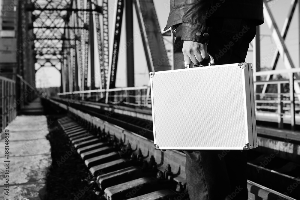 monochrome photo of silver metal case with money transfer concep monochrome photo of silver metal case with money transfer concep