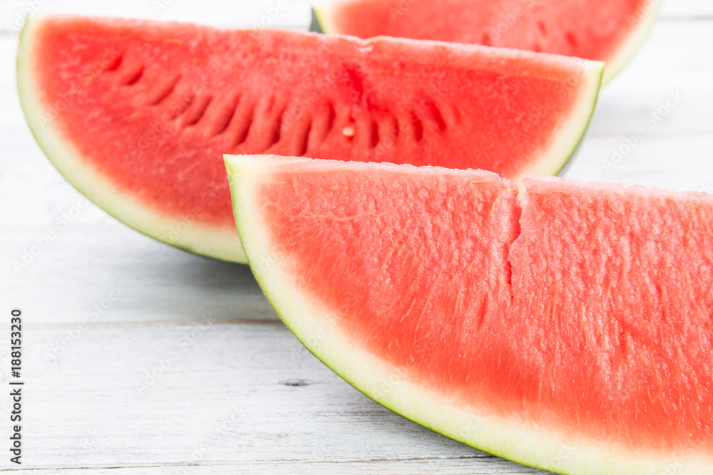 Watermelon on wooden table background Watermelon on wooden table background