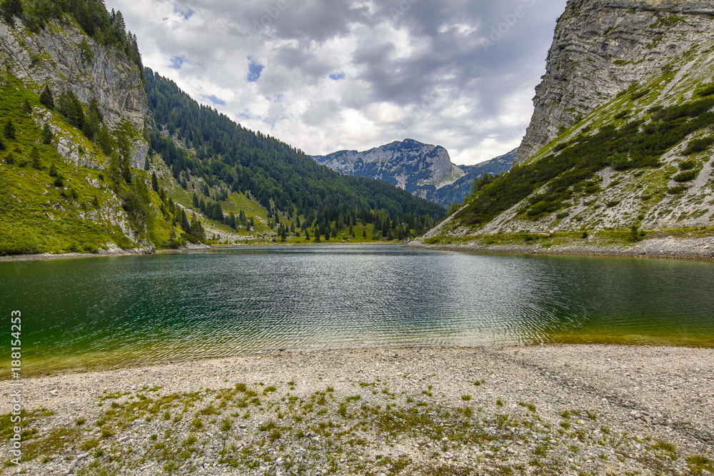 Krnsko jezero lake with mountain Krn Stock Photo | Adobe Stock