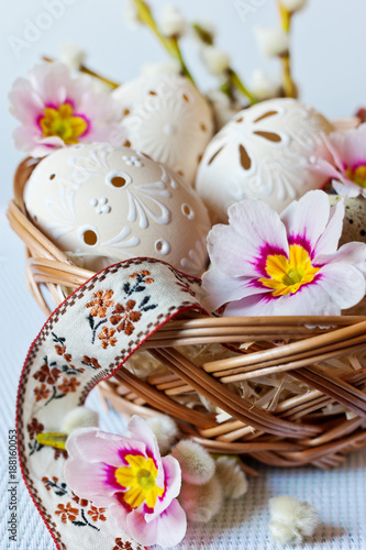 Czech traditional easter decoration  my own homemade laced white eggs in the nest with flowers and ribbon